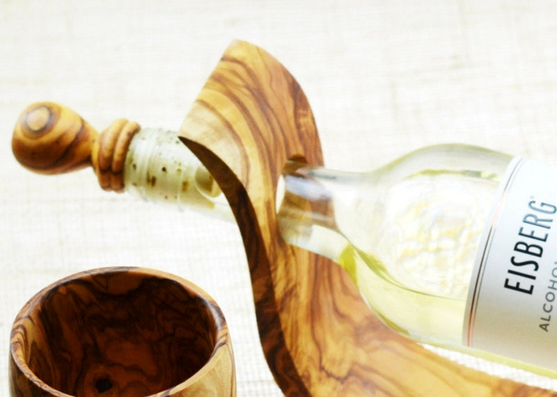 wooden olive wood bottle stopper with bottle stand bouchon de bouteille en bois d'olivier by MR OLIVEWOOD® wholesale manufacturer US based supplier USA Canada